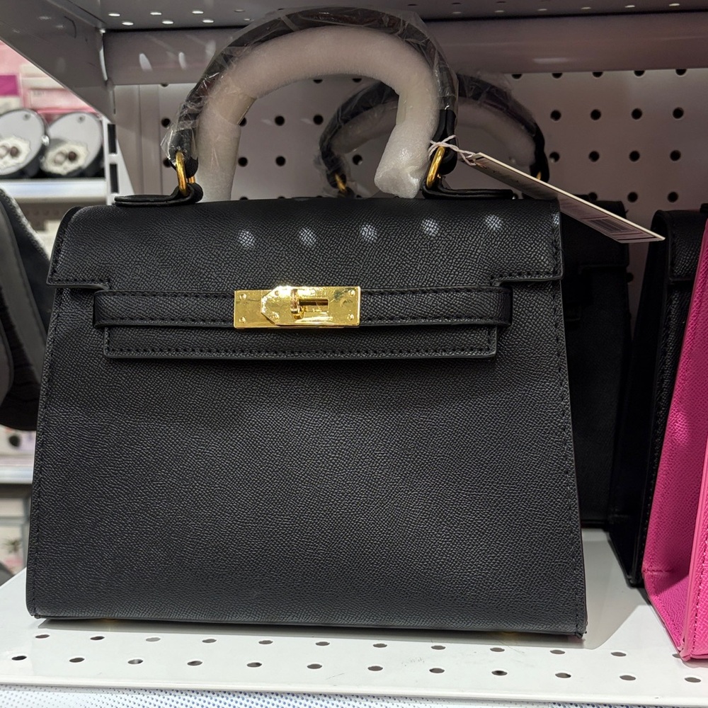 Elegant Black Satchel with Gold Accents